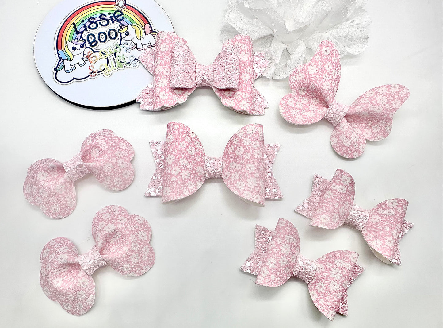 Pink floral hair accessories (sold individually)