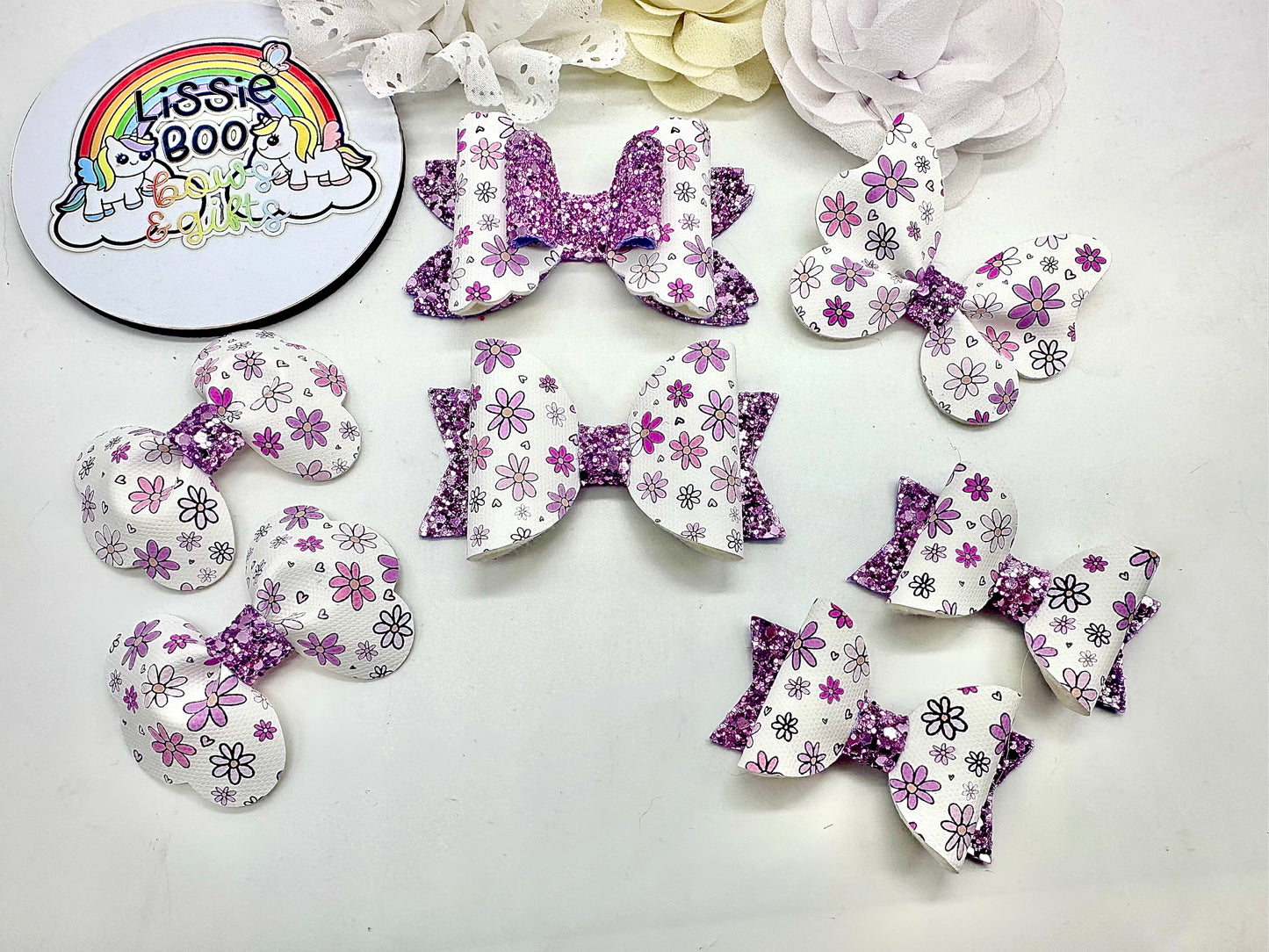 Purple and pink floral hair accessories (sold individually)