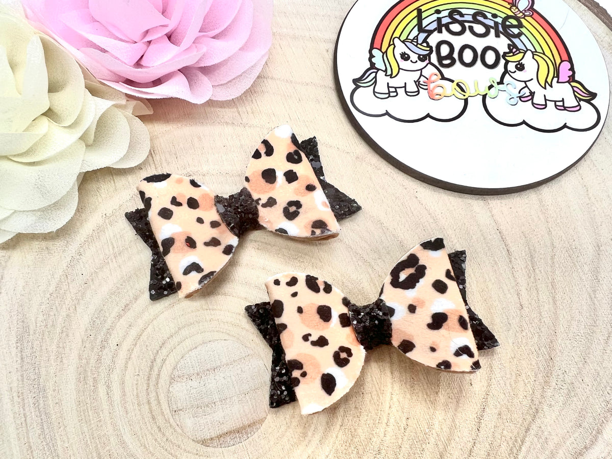 2.5” animal print piggytail bows