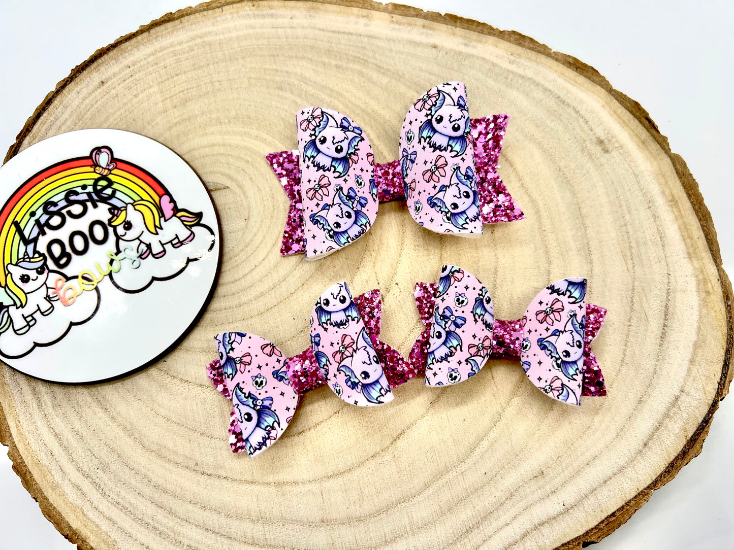 Pink bats hair bows (sold individually)