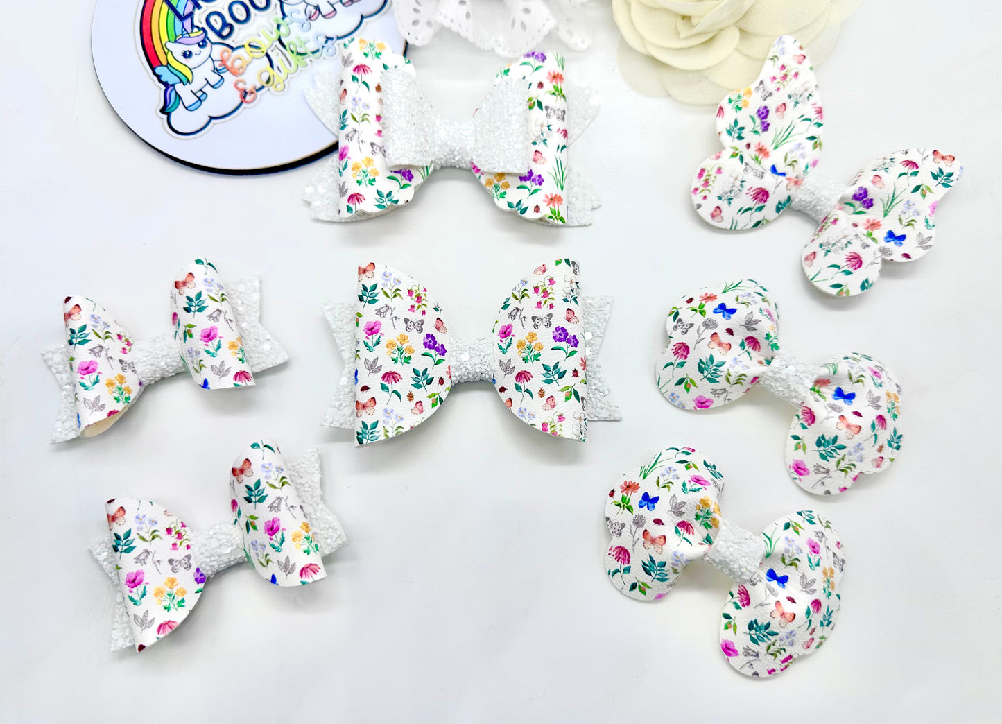 White floral hair accessories (sold individually)