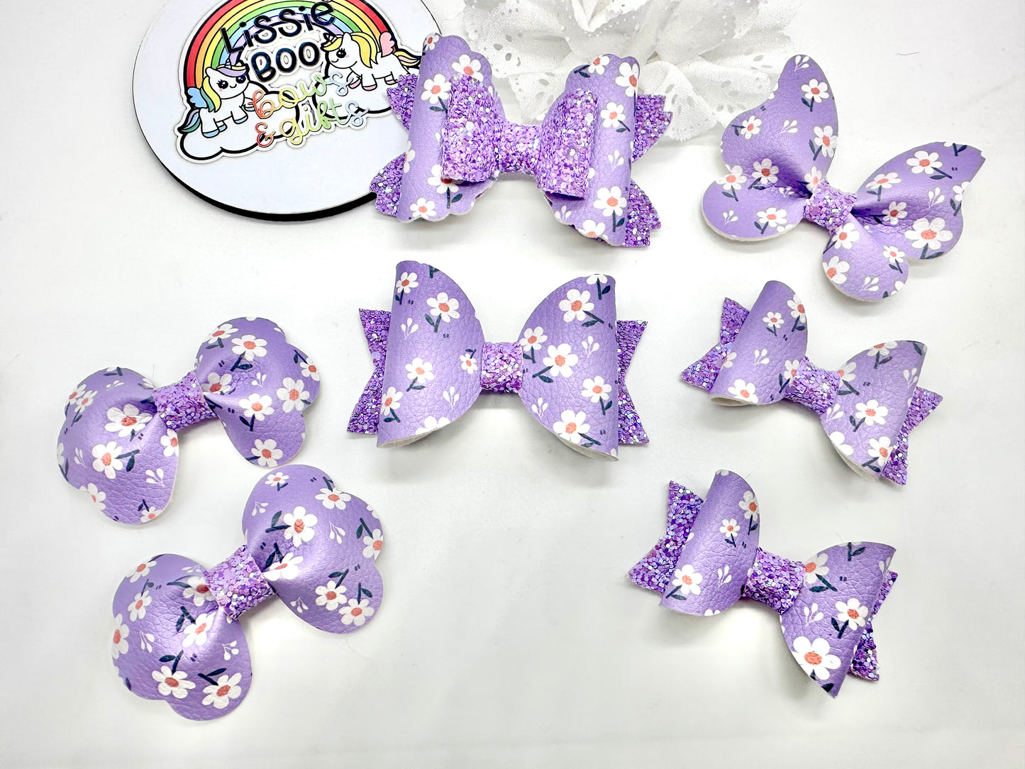 Purple floral hair accessories (sold individually)