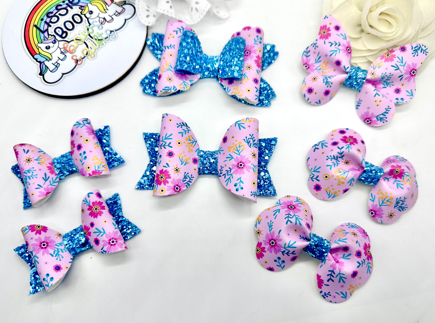 Pink and blue floral hair accessories (sold individually)