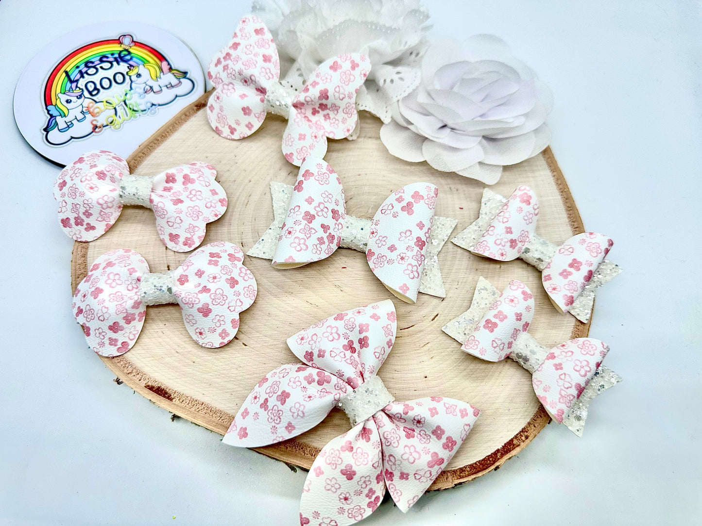 Peachy pink floral hair accessories (sold individually)