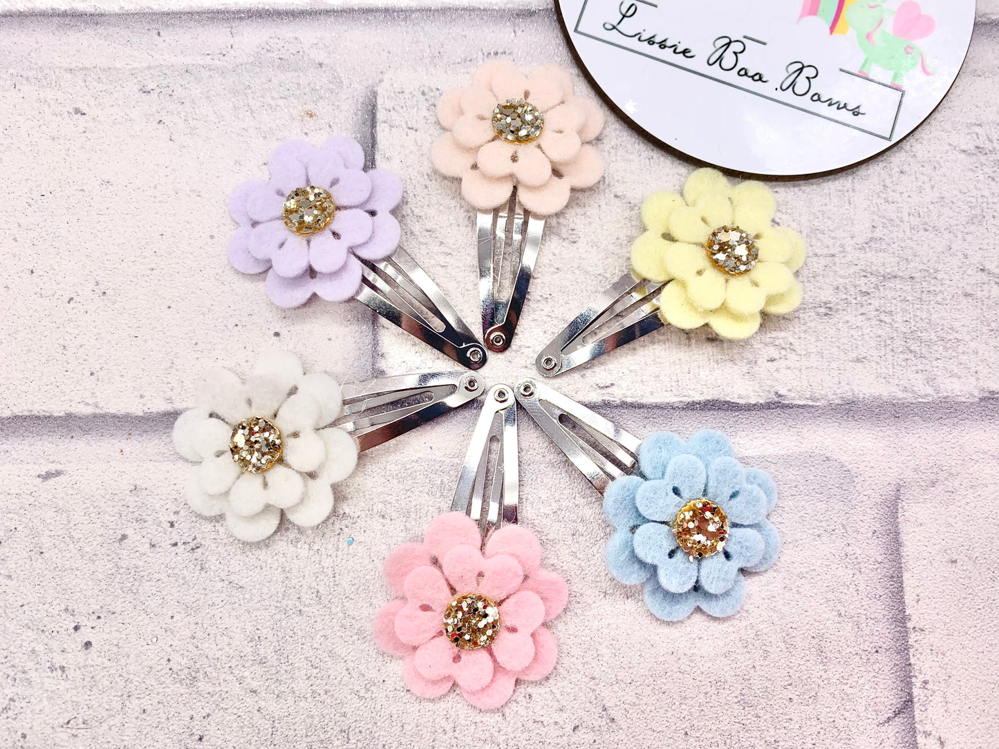 Double flower hair clips (one supplied)