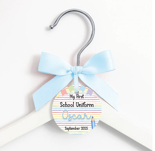 First day of … coat hanger, ribbon and tag
