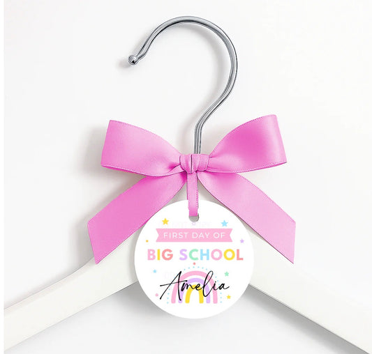 First day of … coat hanger, ribbon and tag