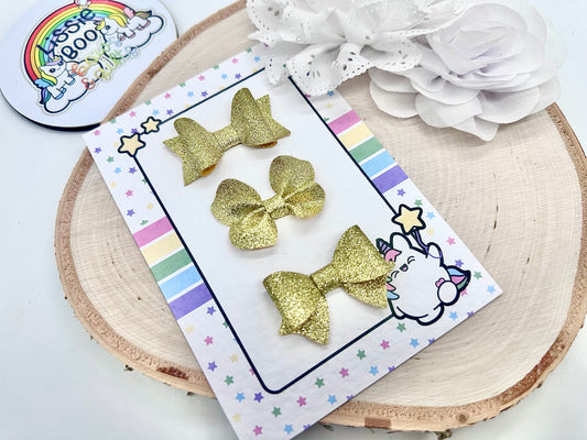 Set of three fine glitter gold hair accessories