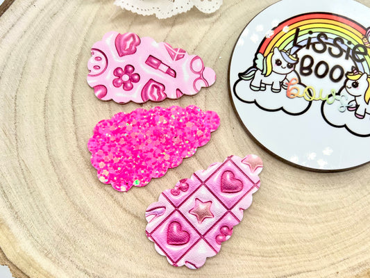 Set of three hot pink hair clips