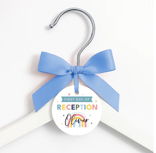 First day of … coat hanger, ribbon and tag