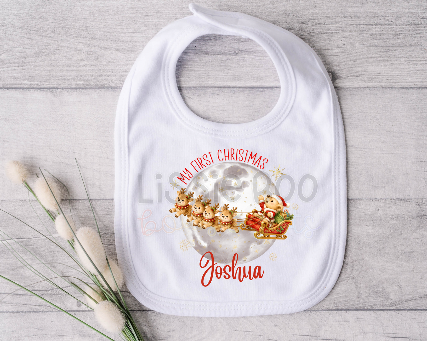 Santa’s sleigh personalised baby’s first Christmas bib