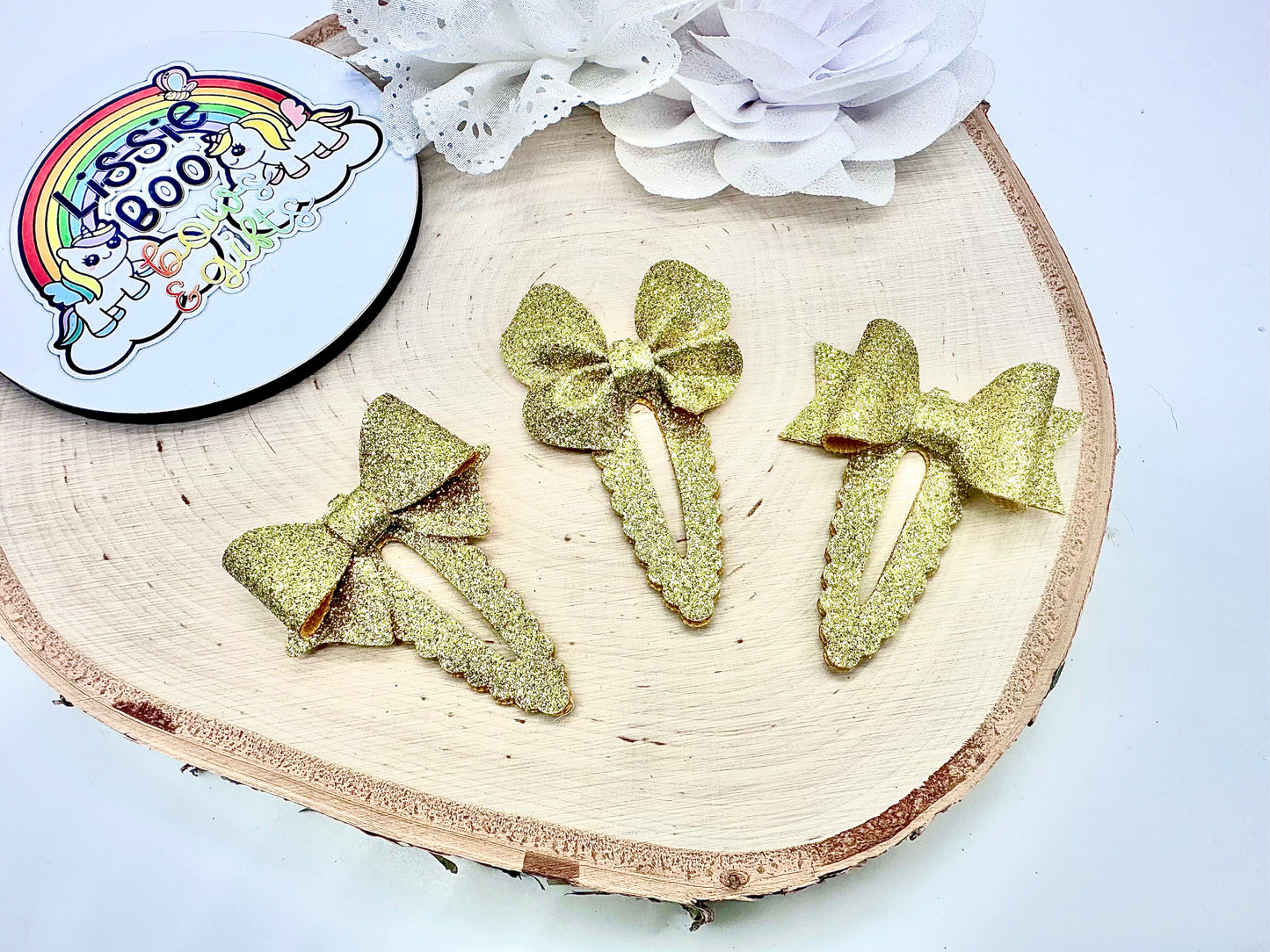 Set of three gold fine glitter hair clips - 5cm