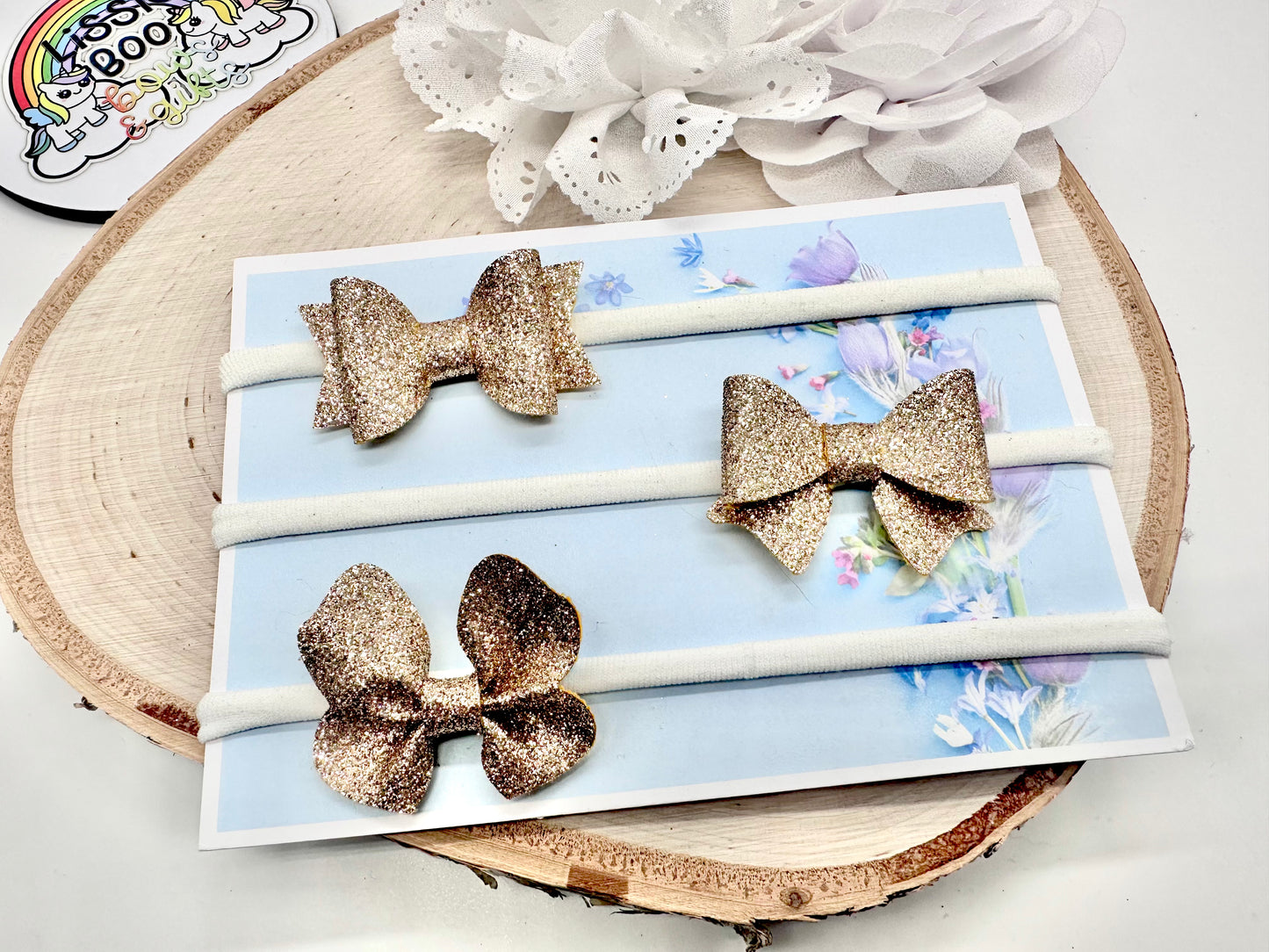Set of three rose gold fine glitter metallic baby headbands