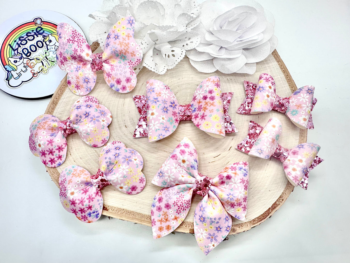Pink floral hair accessories (sold individually)