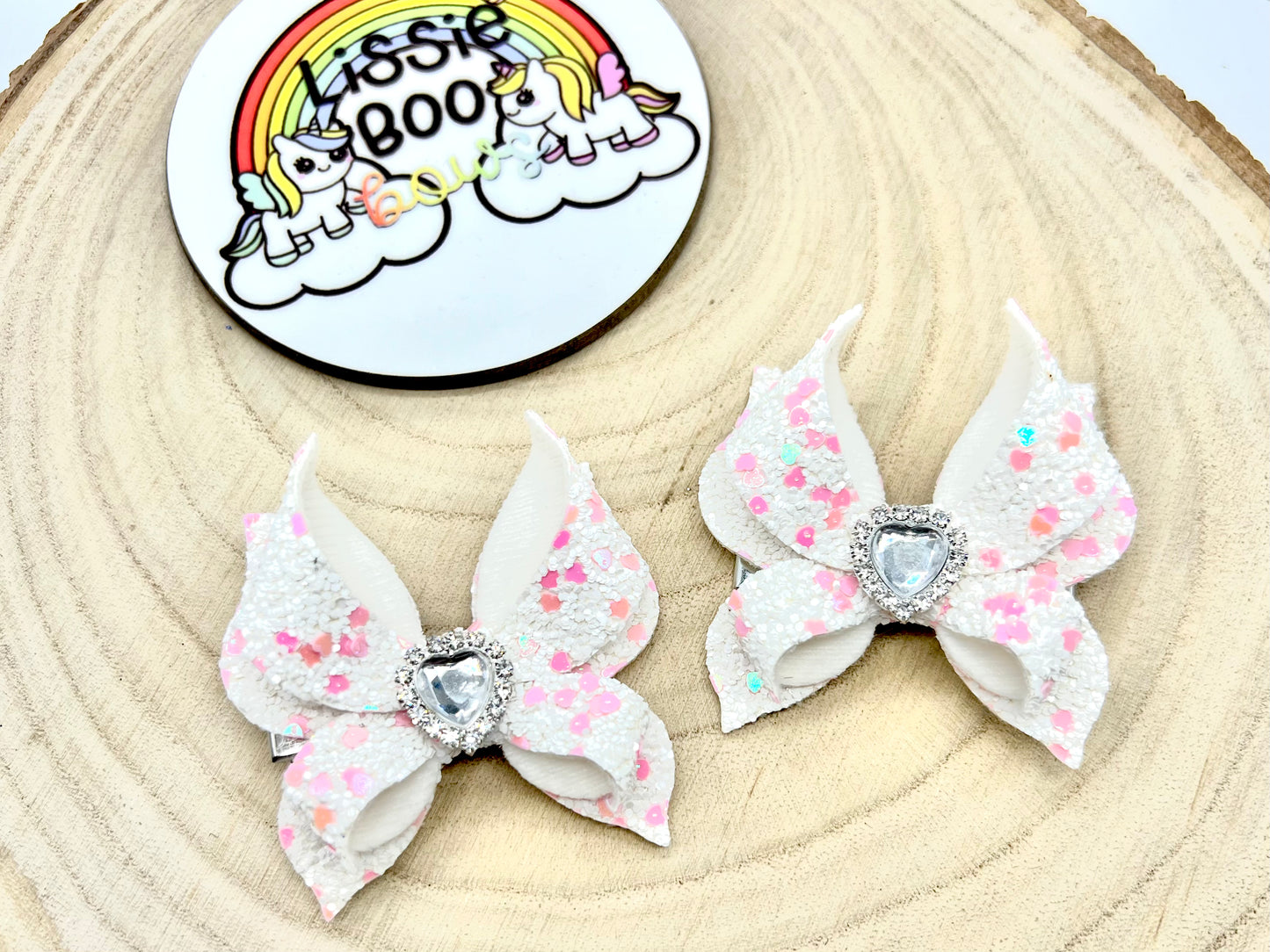 White and pink speckled butterfly bow piggytail set