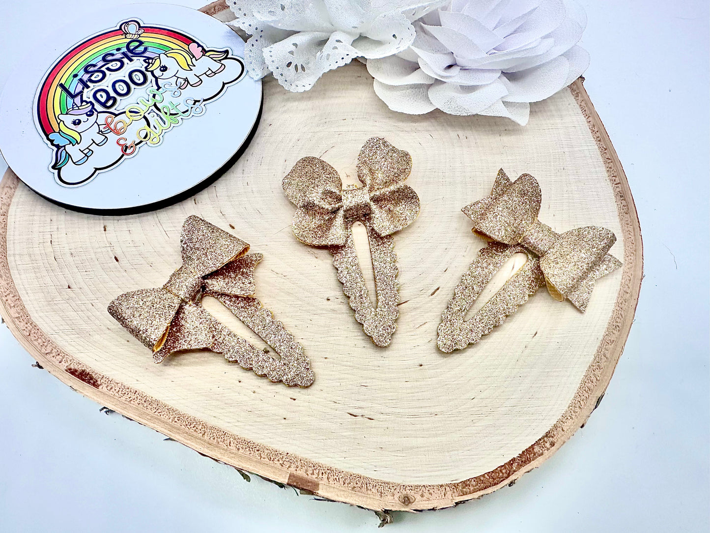 Set of three rose gold fine glitter hair clips - 5cm