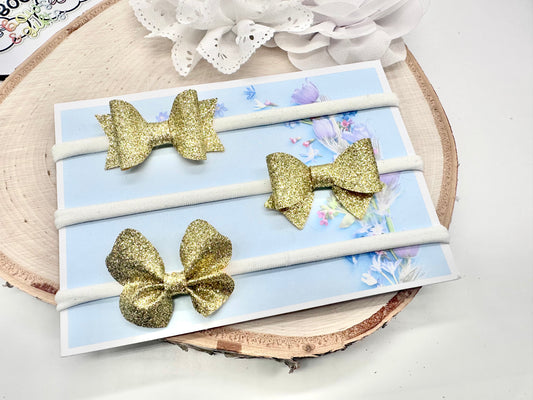Set of three gold fine glitter metallic baby headbands