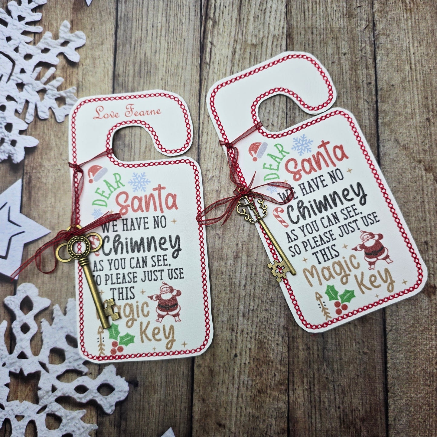 Santa’s magic key embroidered door hanger