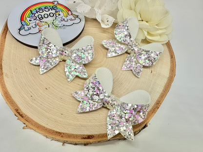 Pink sparkle winter 2.5” fancy hair bow