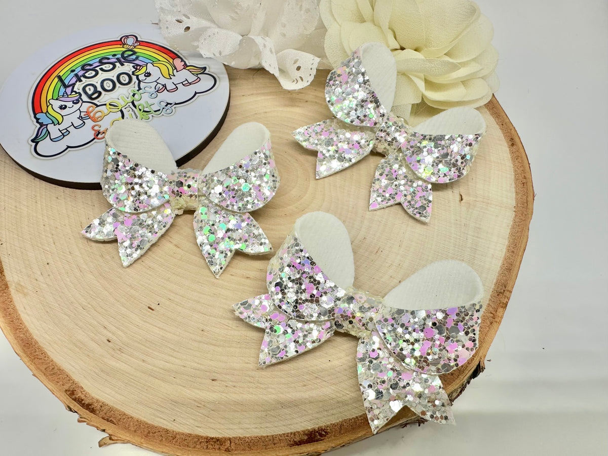 Pink sparkle winter 2.5” fancy hair bow