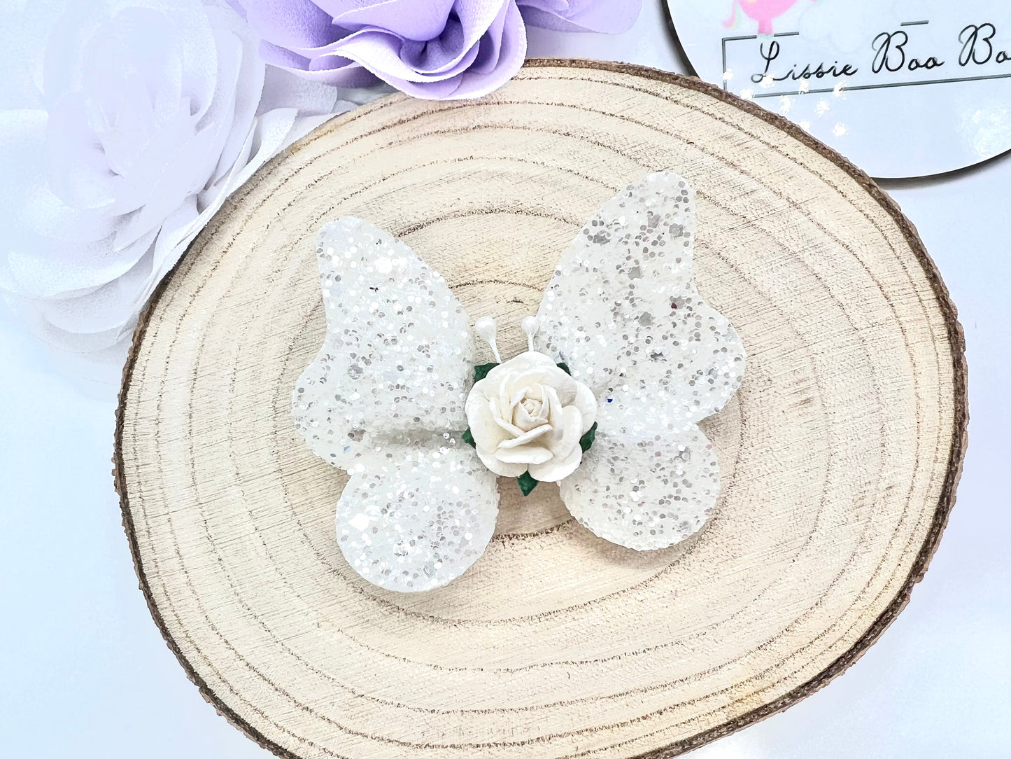 White glitter butterfly hair accessory